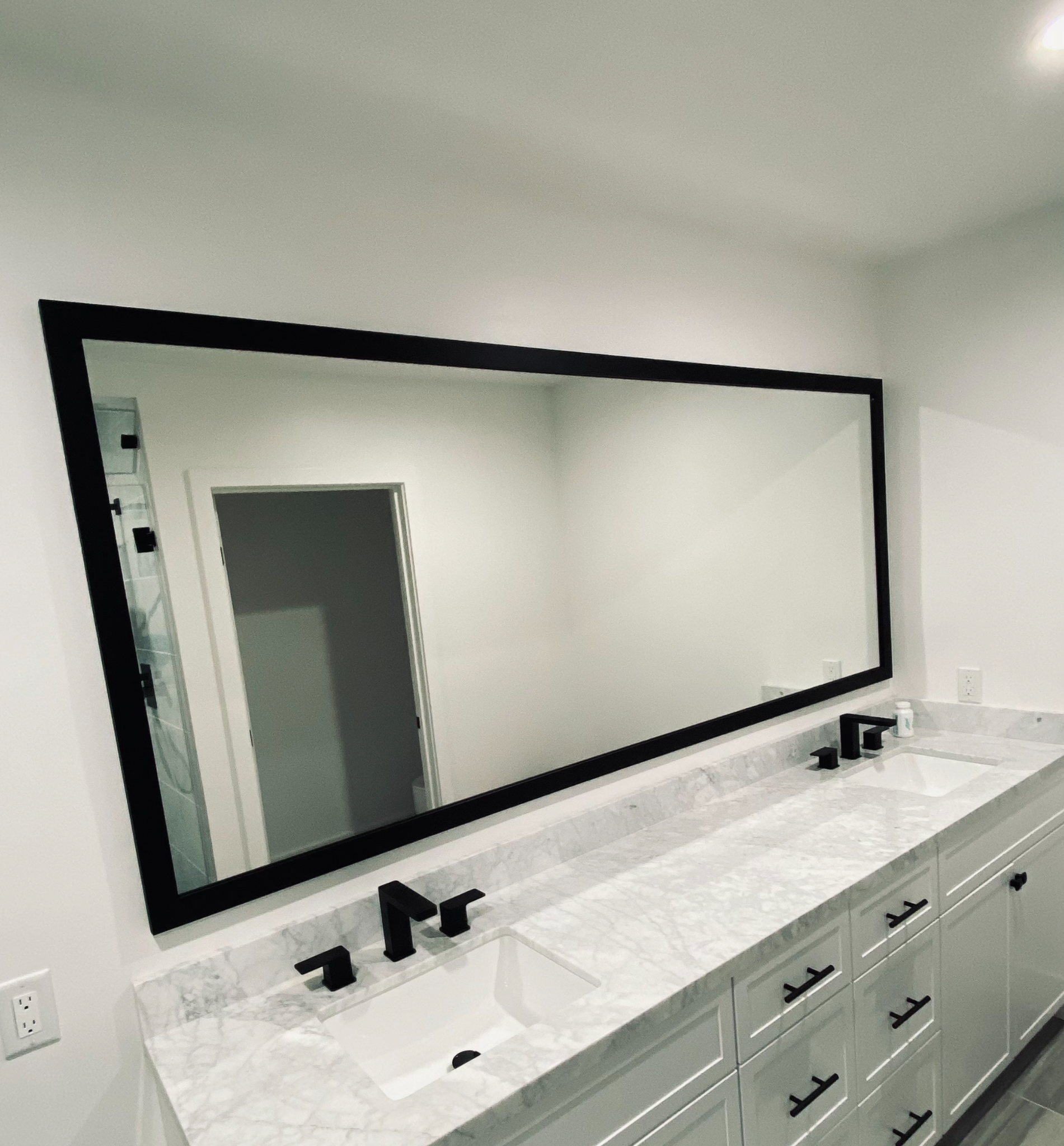 Framed mirrors installed by DC Glass