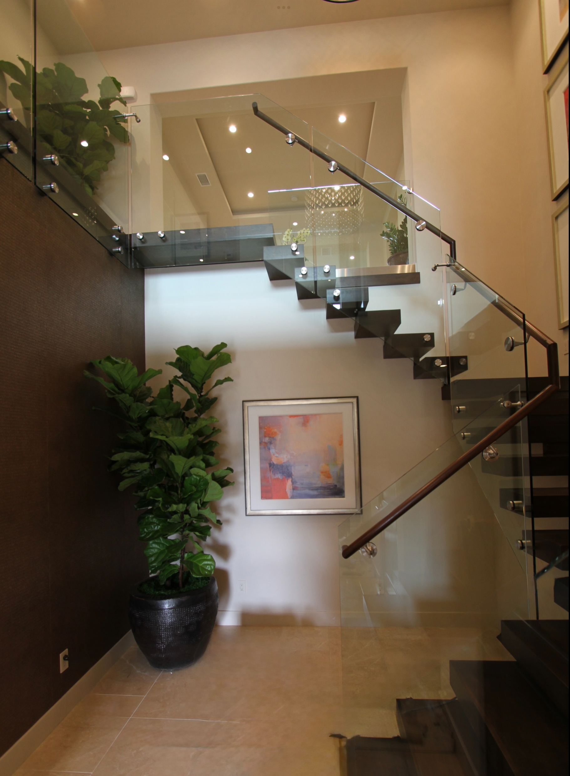 Custom glass staircase railings installed by DC Glass